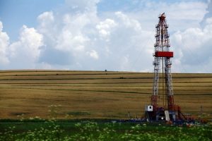 32622822 - color shot of a shale gas drilling rig on a field.